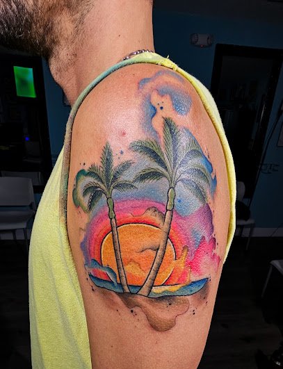 Over Omega Tattooing