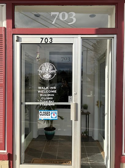 Twisted Roots Tattoo