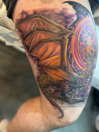 Feather and fang tattoo art studio